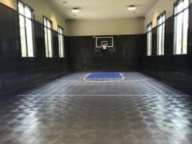 ndoor gym and wall mount basketball goal in graphite and dark blue